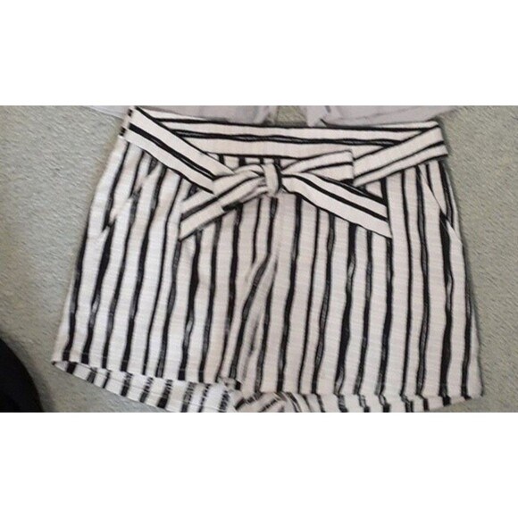 lucid pink Pants - Lucid pink shorts m black white striped shorts.  tie bow in front or back.